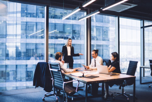People in an Office - private equity procurement discussion
